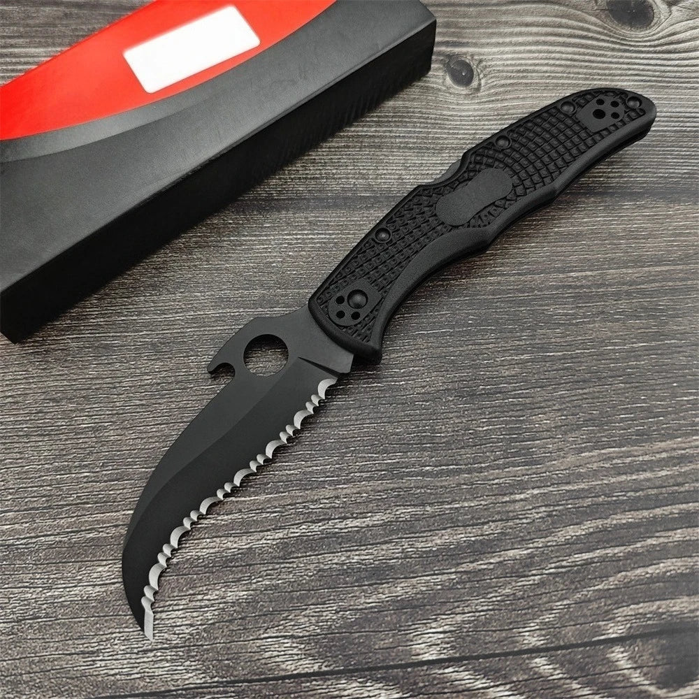 Two Serrated Folding Knives with Hawkbill D2 Blades Durable Textured Nylon Fiber Handles Signature Thumb Hole for Smooth Opening Available in Black and Silver Finishes These Reliable Tools Are Perfect for Everyday Carry Campi