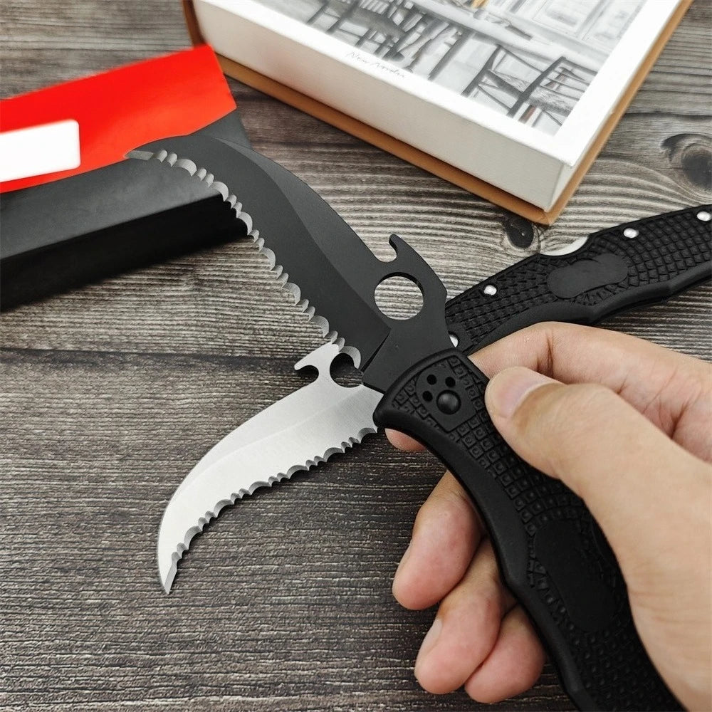 Two Serrated Folding Knives with Hawkbill D2 Blades Durable Textured Nylon Fiber Handles Signature Thumb Hole for Smooth Opening Available in Black and Silver Finishes These Reliable Tools Are Perfect for Everyday Carry Campi