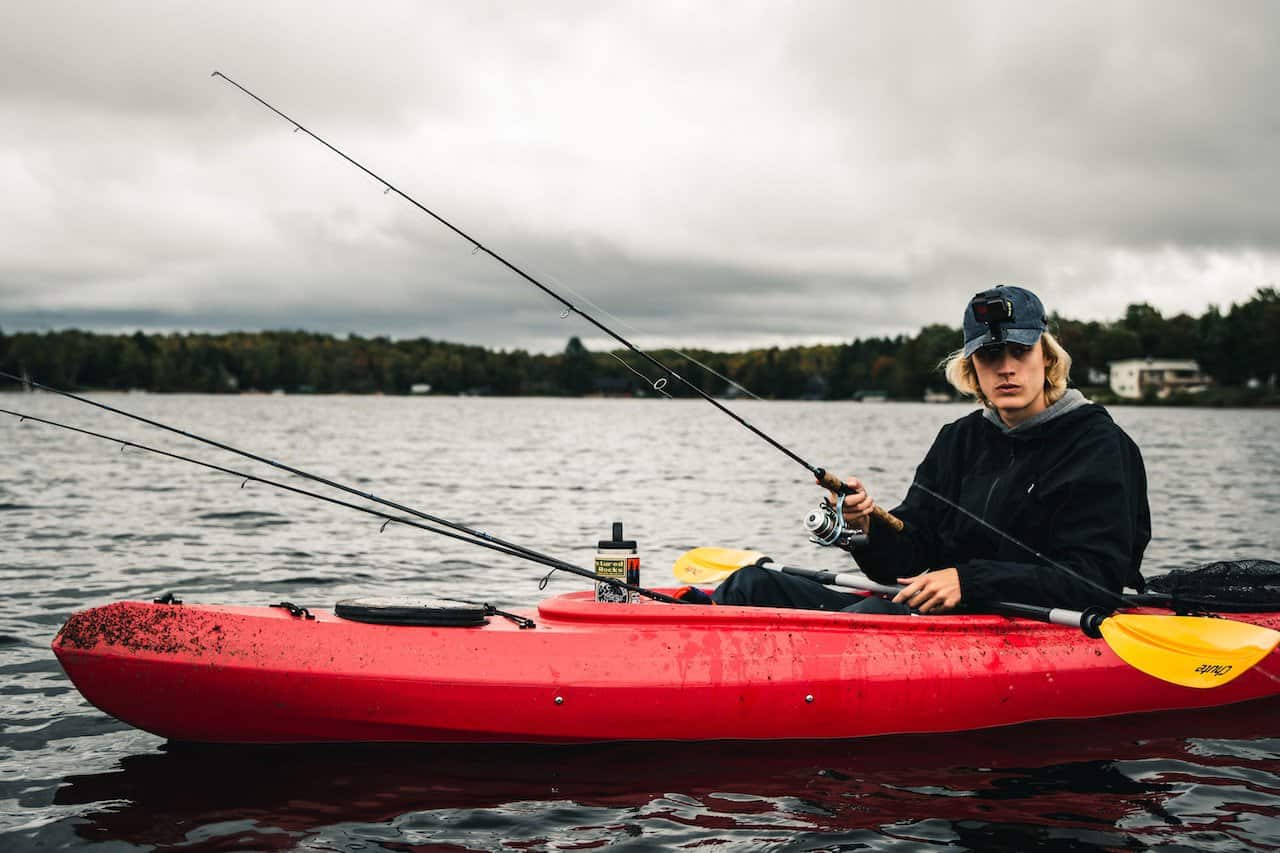 fishing kayak woman red